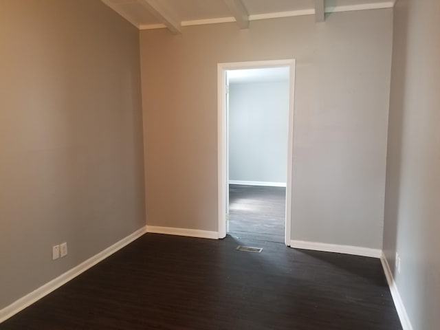 5007 Jarrett Rd, Chattanooga, TN 37416 - empty room with beamed ceiling and dark wood-style flooring