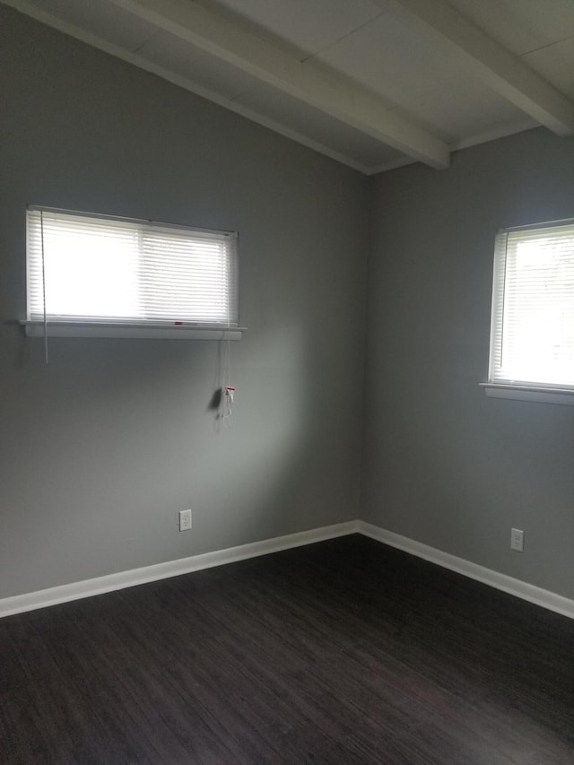 5007 Jarrett Rd, Chattanooga, TN 37416 - unfurnished room featuring beamed ceiling, dark wood-style floors, and healthy amount of natural light