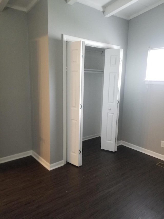 5007 Jarrett Rd, Chattanooga, TN 37416 - unfurnished bedroom with dark wood finished floors and a closet
