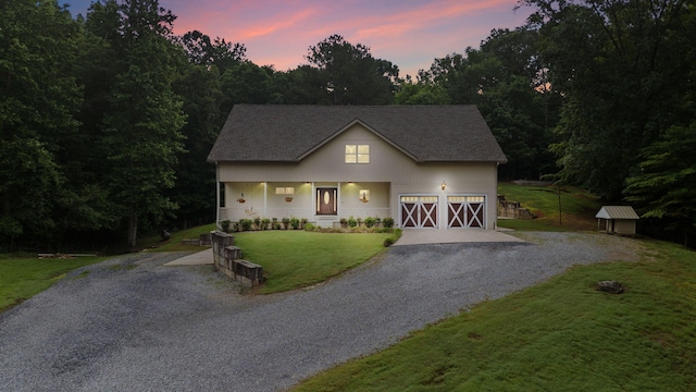 210 Gordon Dr, Chatsworth, GA 30705 - view of front facade featuring driveway, a yard, a garage, and covered porch