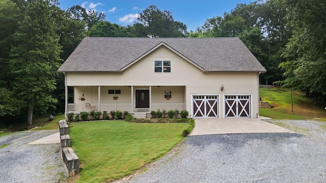 210 Gordon Dr, Chatsworth, GA 30705 - view of front of house with gravel driveway, a front yard, a garage, a porch, and roof with shingles