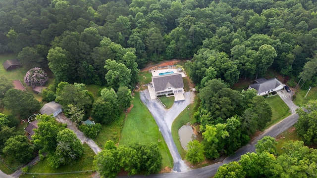 210 Gordon Dr, Chatsworth, GA 30705 - aerial view of property and surrounding area with a heavily wooded area