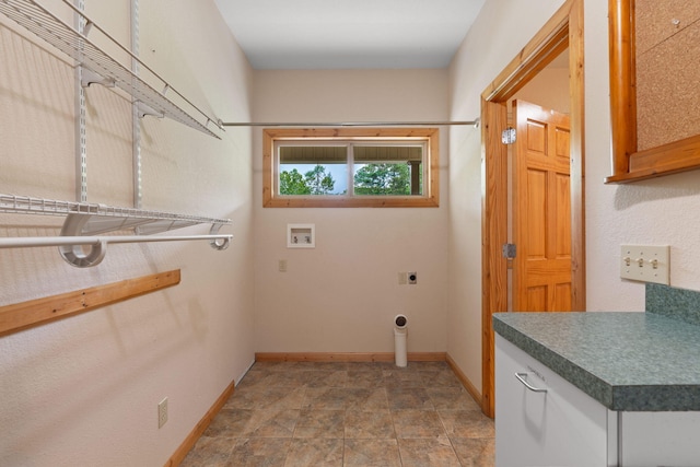 210 Gordon Dr, Chatsworth, GA 30705 - washroom with electric dryer hookup, hookup for a washing machine, and stone finish floors