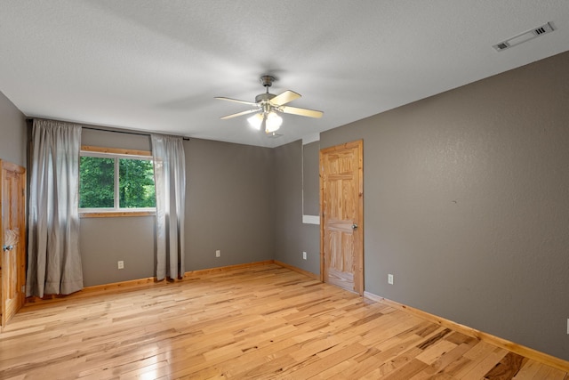 210 Gordon Dr, Chatsworth, GA 30705 - unfurnished room with ceiling fan and light wood finished floors
