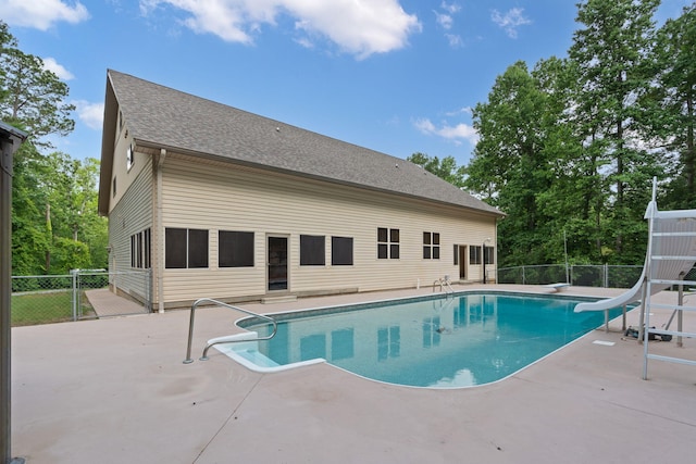 210 Gordon Dr, Chatsworth, GA 30705 - view of swimming pool featuring a patio area, a diving board, and a water slide