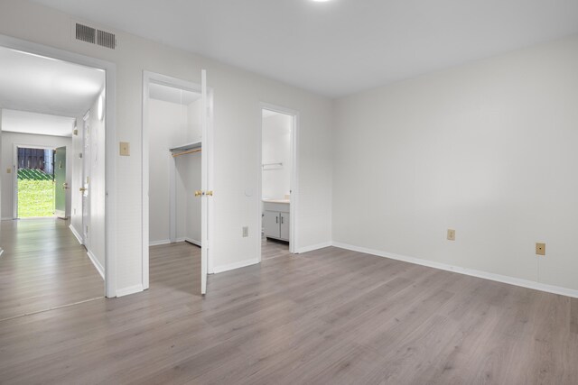 900 Mountain Creek Rd Unit E66, Chattanooga, TN 37405 - unfurnished bedroom featuring wood finished floors and baseboards
