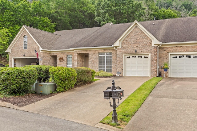 6276 Amber Brook Dr, Hixson, TN 37343 - view of front of property with roof with shingles, driveway, and brick siding