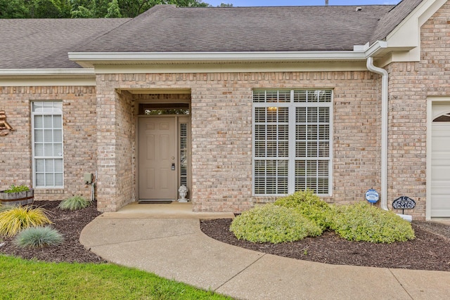 6276 Amber Brook Dr, Hixson, TN 37343 - property entrance featuring a shingled roof and brick siding