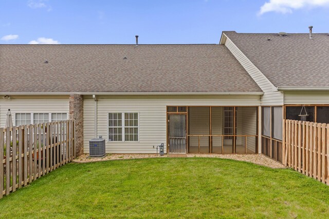 6276 Amber Brook Dr, Hixson, TN 37343 - back of house with a sunroom, a fenced backyard, and roof with shingles