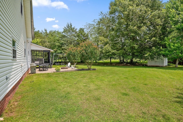7470 Jester Ct, Ooltewah, TN 37363 - view of grassy yard with a gazebo, a storage shed, a patio, and view of scattered trees