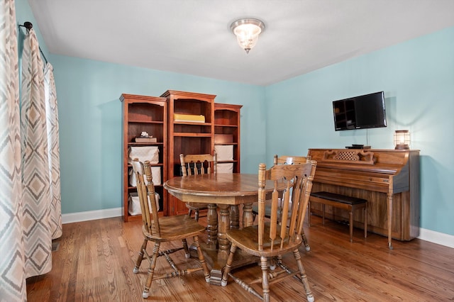 7470 Jester Ct, Ooltewah, TN 37363 - dining area with baseboards and wood finished floors