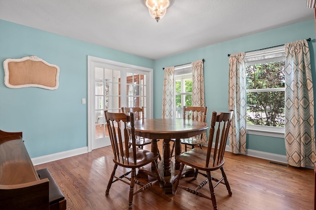 7470 Jester Ct, Ooltewah, TN 37363 - dining room with baseboards and wood finished floors