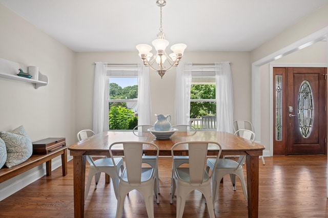 7470 Jester Ct, Ooltewah, TN 37363 - dining space featuring a chandelier and wood finished floors