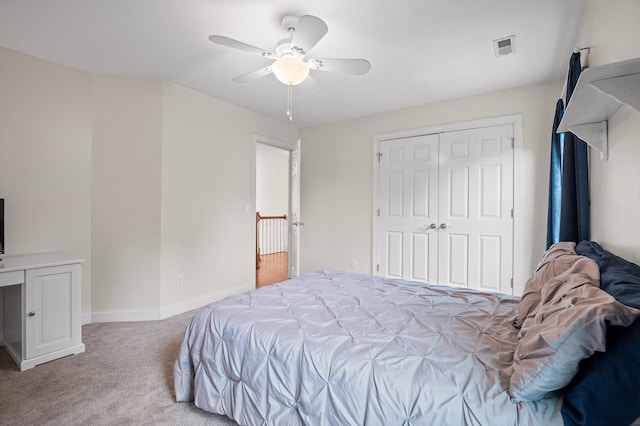 7470 Jester Ct, Ooltewah, TN 37363 - bedroom featuring light carpet, a closet, and ceiling fan