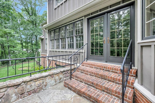 5 Woodland Way, Chattanooga, TN 37419 - entrance to property with board and batten siding, french doors, and brick siding