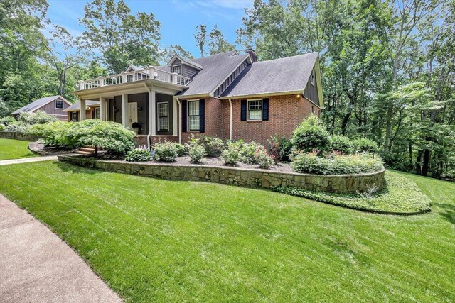 5 Woodland Way, Chattanooga, TN 37419 - view of front of house featuring brick siding, a front yard, and a shingled roof