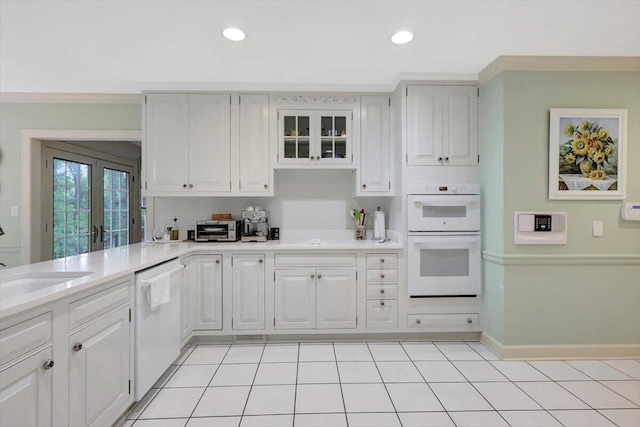 5 Woodland Way, Chattanooga, TN 37419 - kitchen featuring white appliances, light countertops, white cabinetry, recessed lighting, and glass insert cabinets