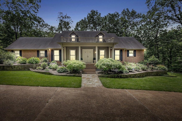 5 Woodland Way, Chattanooga, TN 37419 - view of front of property with a front lawn, brick siding, and a balcony