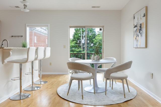 844 E 8th St, Chattanooga, TN 37403 - dining room with healthy amount of natural light and light wood-style flooring
