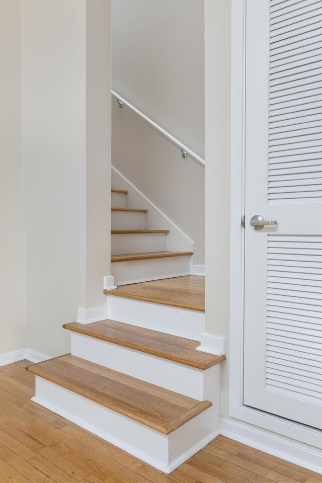844 E 8th St, Chattanooga, TN 37403 - staircase with wood-type flooring and baseboards