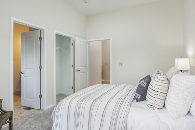 844 E 8th St, Chattanooga, TN 37403 - bedroom featuring light colored carpet and a spacious closet