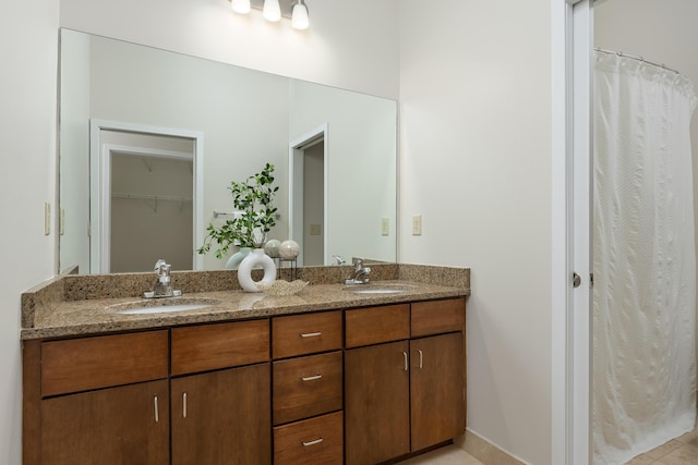 844 E 8th St, Chattanooga, TN 37403 - bathroom featuring double vanity and a closet
