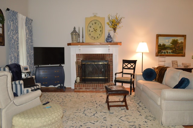 8211 Troubadour Way, Ooltewah, TN 37363 - living area featuring a fireplace and wood finished floors