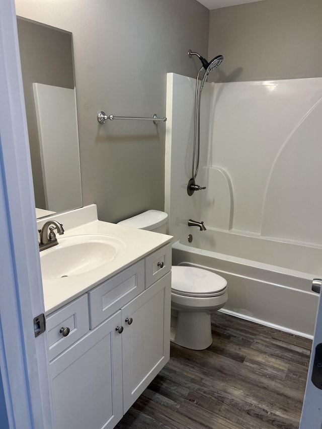 204 Roslyn Ct, Dalton, GA 30720 - bathroom with vanity, washtub / shower combination, and wood finished floors
