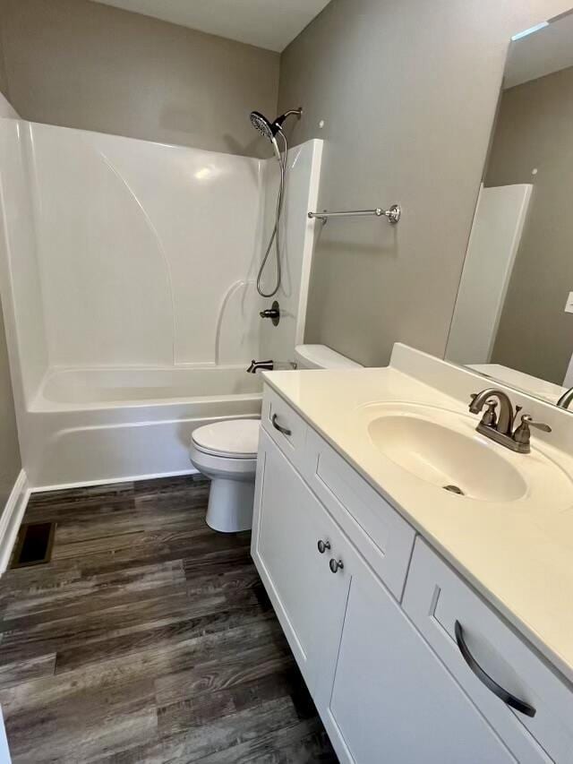 204 Roslyn Ct, Dalton, GA 30720 - full bathroom featuring vanity, shower / tub combination, and wood finished floors