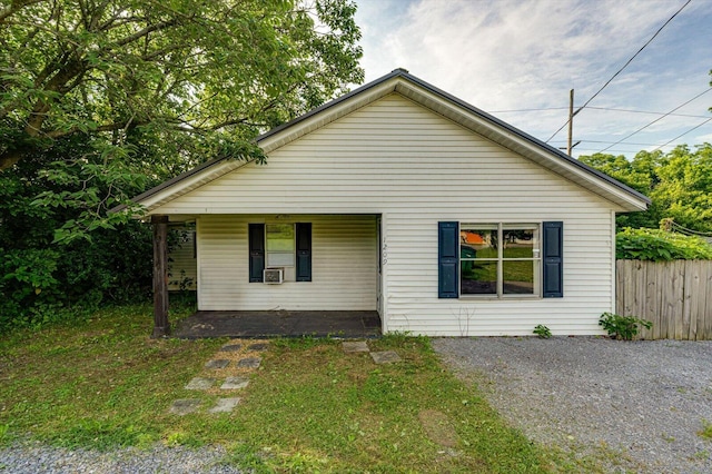 1209 Hickory Ave, South Pittsburg, TN 37380 - bungalow featuring covered porch and cooling unit