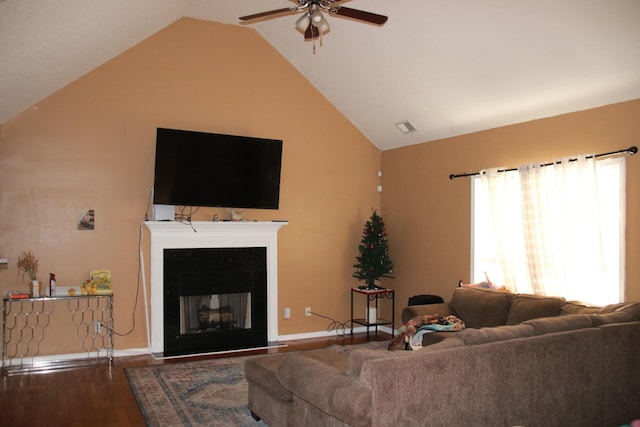 140 Chestnut Ln SE, Calhoun, GA 30701 - living room with ceiling fan, vaulted ceiling, wood finished floors, and a glass covered fireplace