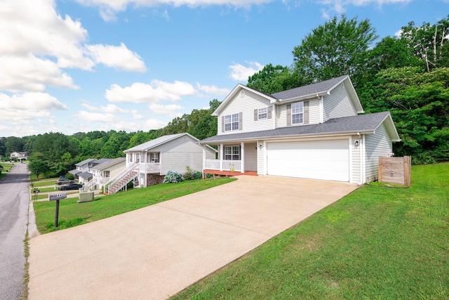 4429 Kayla Cir, Chattanooga, TN 37406 - traditional home with driveway, a garage, a front yard, and a porch