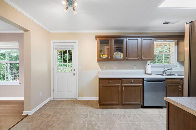 4429 Kayla Cir, Chattanooga, TN 37406 - kitchen featuring stainless steel dishwasher, light countertops, ornamental molding, and glass insert cabinets