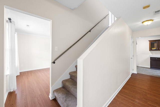 4429 Kayla Cir, Chattanooga, TN 37406 - staircase featuring wood finished floors and crown molding