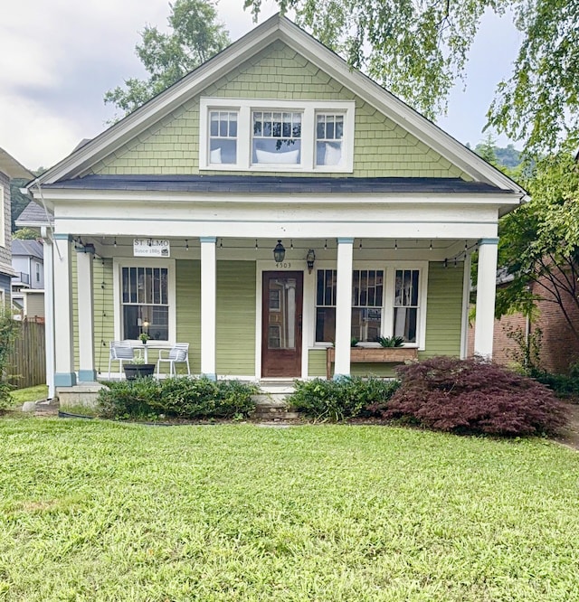4503 Saint Elmo Ave, Chattanooga, TN 37409 - view of front facade featuring a porch and a front lawn