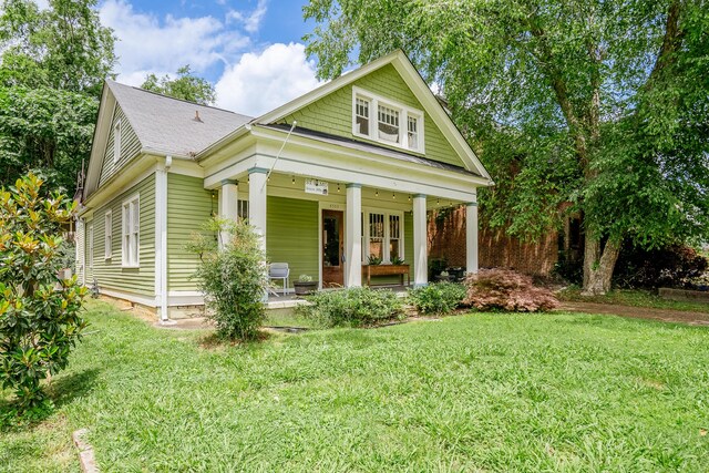 4503 Saint Elmo Ave, Chattanooga, TN 37409 - greek revival inspired property with a porch, a front yard, and a shingled roof