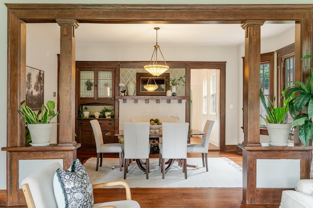4503 Saint Elmo Ave, Chattanooga, TN 37409 - dining area featuring decorative columns and wood finished floors