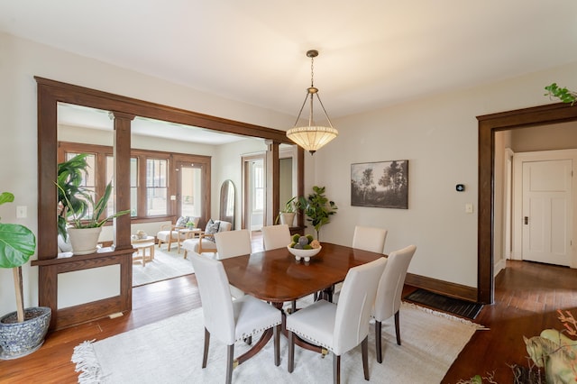 4503 Saint Elmo Ave, Chattanooga, TN 37409 - dining room with wood finished floors and ornate columns