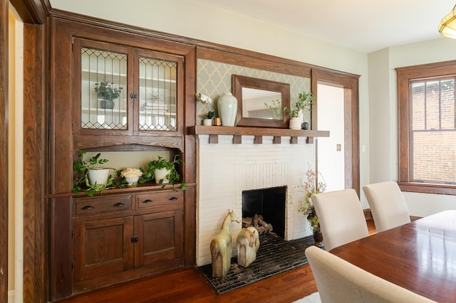 4503 Saint Elmo Ave, Chattanooga, TN 37409 - dining room featuring dark wood-style flooring and a fireplace