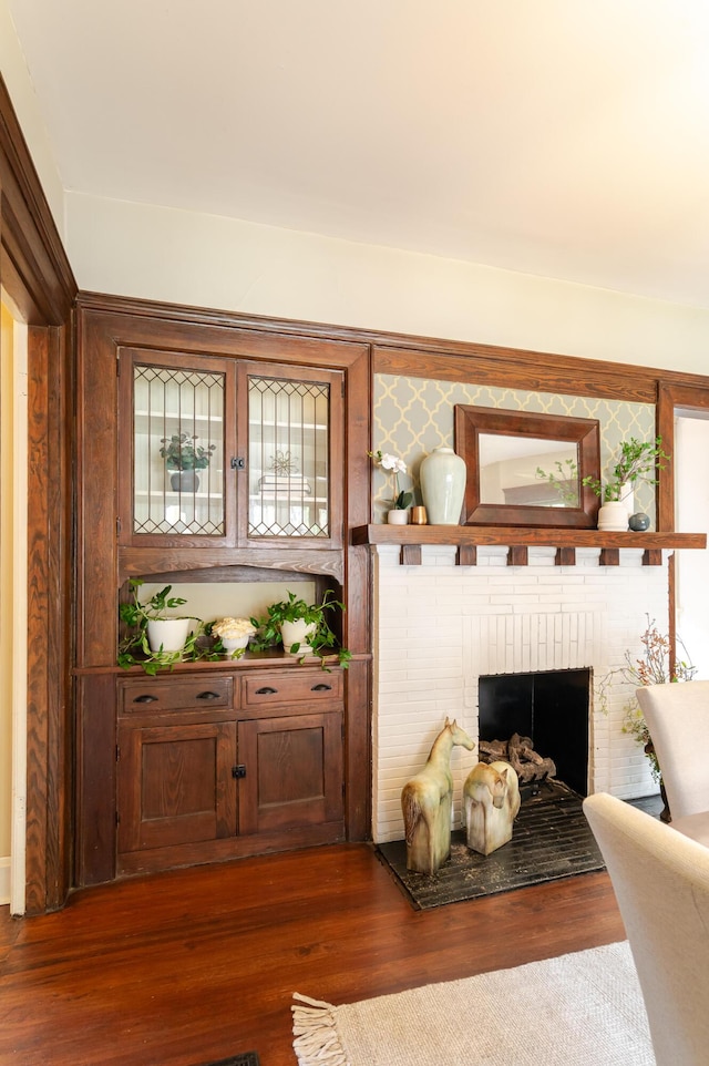 4503 Saint Elmo Ave, Chattanooga, TN 37409 - living area with dark wood-type flooring and a fireplace