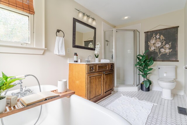 4503 Saint Elmo Ave, Chattanooga, TN 37409 - bathroom with vanity, a shower stall, a soaking tub, and recessed lighting