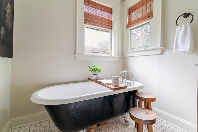 4503 Saint Elmo Ave, Chattanooga, TN 37409 - full bathroom with a freestanding tub and baseboards