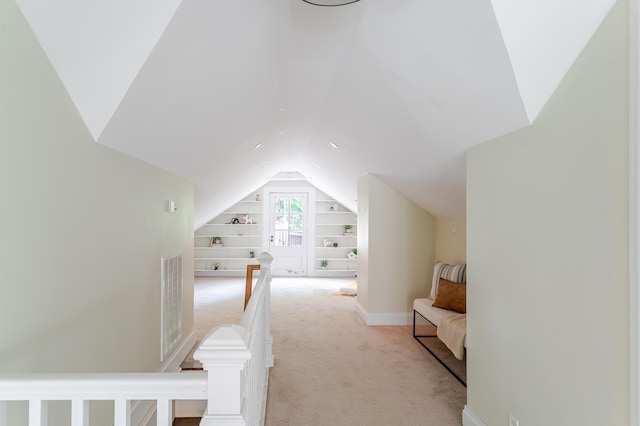 4503 Saint Elmo Ave, Chattanooga, TN 37409 - additional living space featuring light colored carpet, built in shelves, and vaulted ceiling