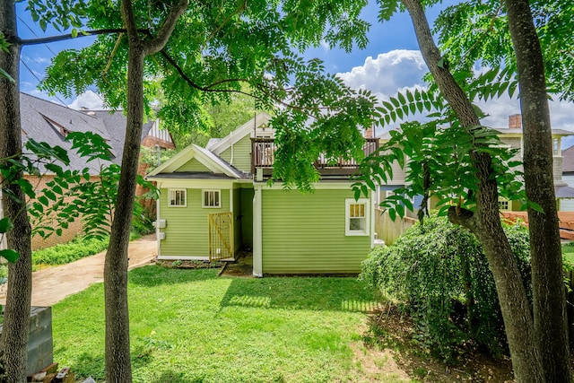 4503 Saint Elmo Ave, Chattanooga, TN 37409 - rear view of house with a yard and a balcony