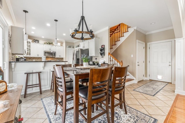 234 Holcomb Rd, Ringgold, GA 30736 - dining area with light tile patterned floors, stairs, crown molding, a chandelier, and recessed lighting