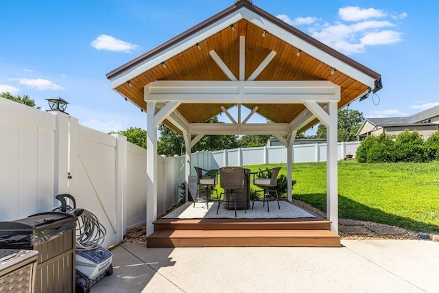 234 Holcomb Rd, Ringgold, GA 30736 - fenced backyard featuring a gazebo, a wooden deck, and outdoor dining area