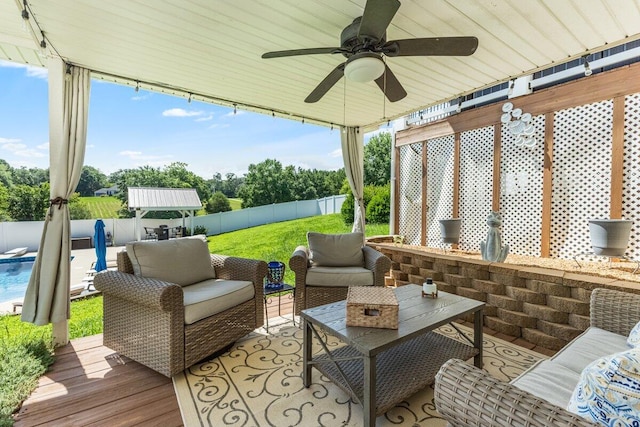 234 Holcomb Rd, Ringgold, GA 30736 - wooden deck with a fenced backyard, a ceiling fan, and an outdoor hangout area