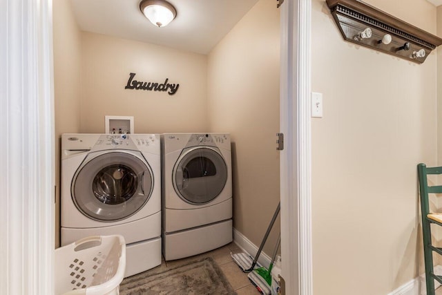234 Holcomb Rd, Ringgold, GA 30736 - laundry area with independent washer and dryer and tile patterned floors
