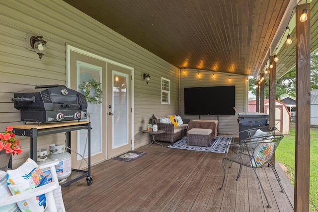 220 Charlene Pl, South Pittsburg, TN 37380 - deck with a storage shed, an outdoor hangout area, and area for grilling