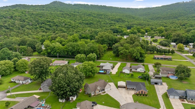 220 Charlene Pl, South Pittsburg, TN 37380 - aerial perspective of suburban area featuring a heavily wooded area